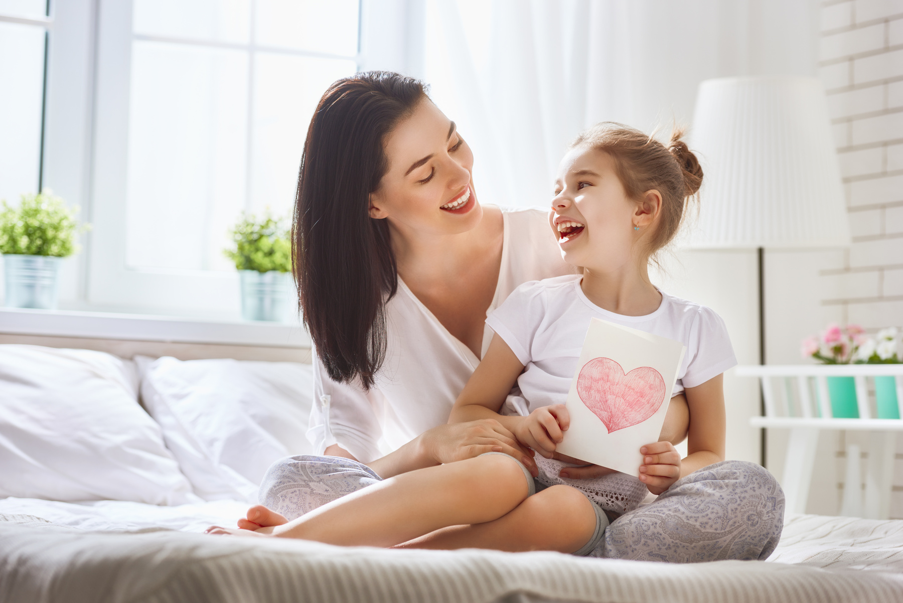 daughter congratulates mom